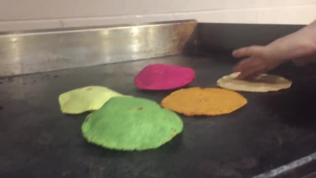Video still showcasing a variety of tortillas on the grill